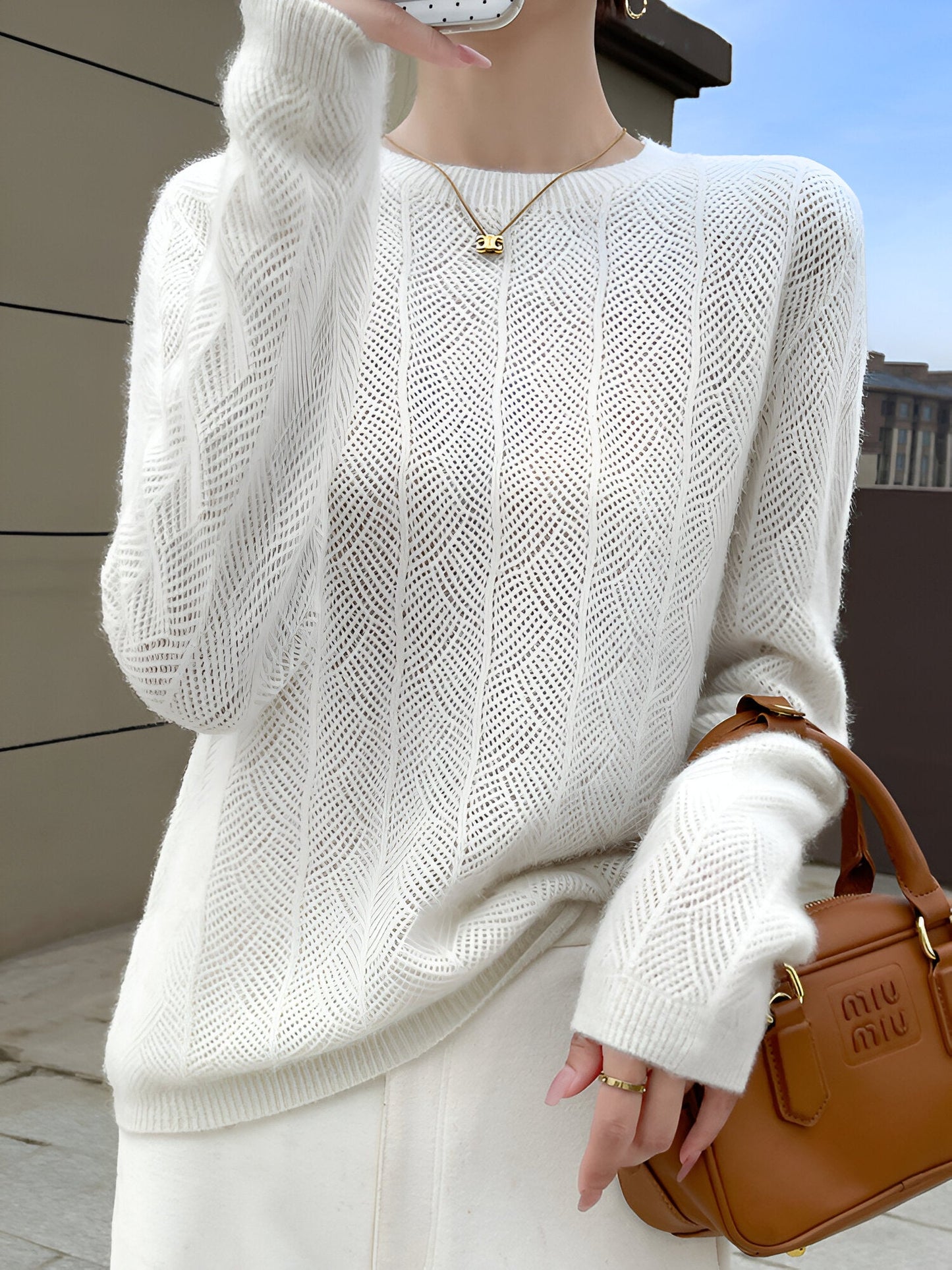Mika™ - Pull en laine mérinos avec d'élégantes découpes